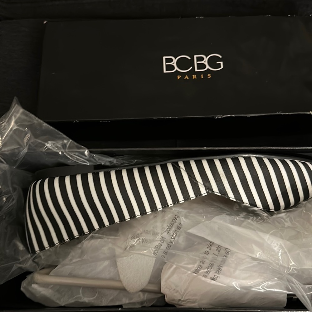 Black and white striped ballet flats